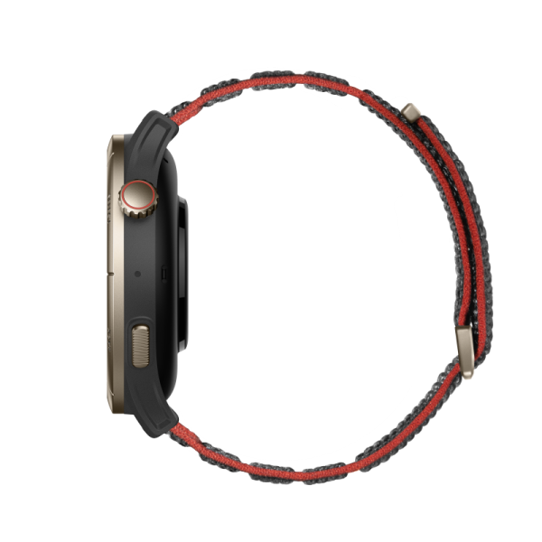 Widok z boku czarnego i złotego smartwatcha z czerwono-szarym paskiem z tkaniny.