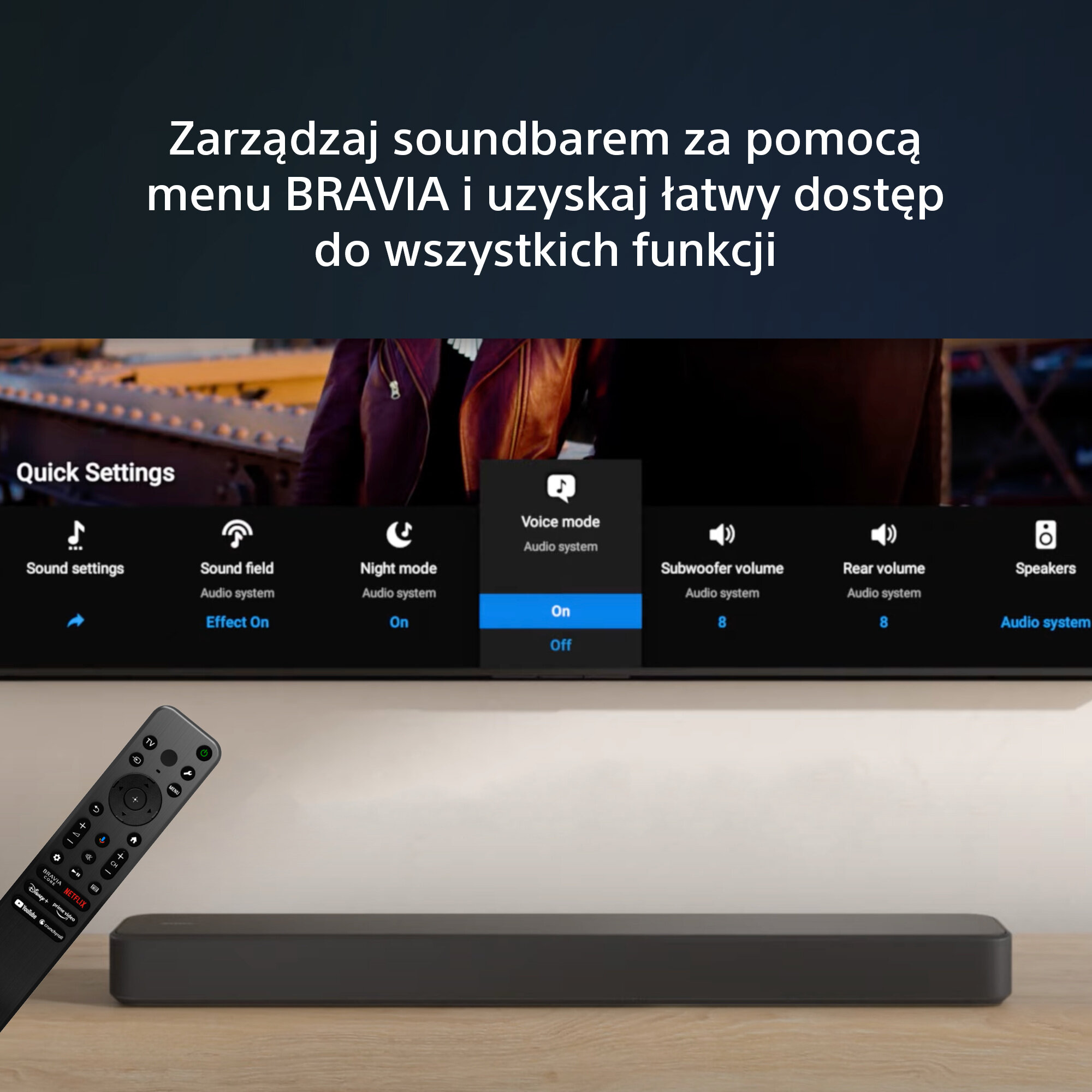Telewizor z menu ustawień dźwięku, pilotem i soundbarem na stole.