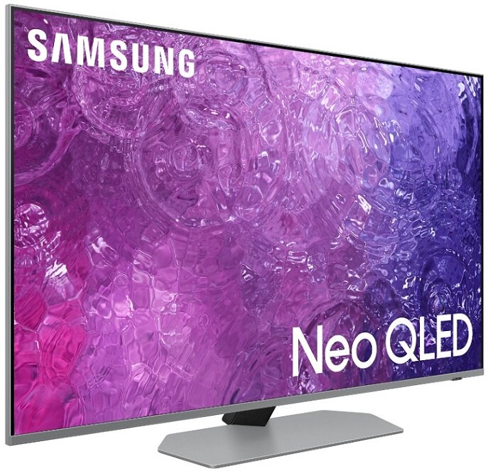 Duży telewizor Samsung Neo QLED z jasnym ekranem wyświetlającym sztukę abstrakcyjną.