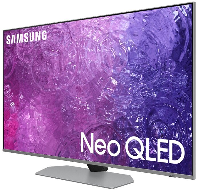 Duży telewizor Samsung Neo QLED wyświetla wirujący fioletowo-biały abstrakcyjny wzór na srebrnej podstawie.