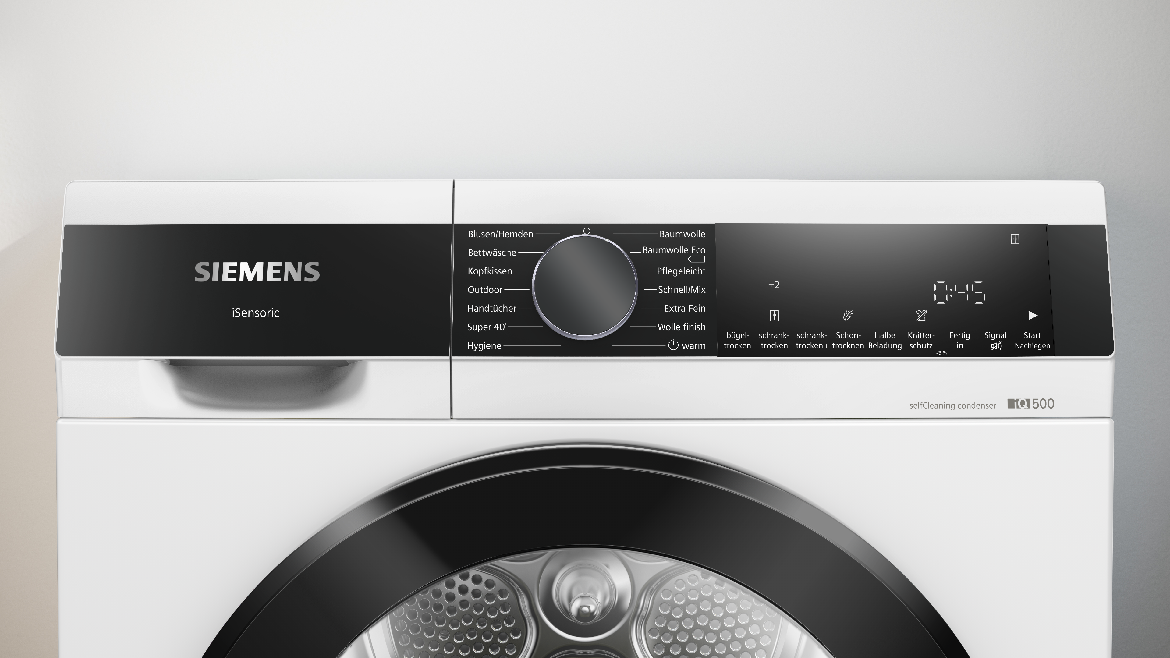 Nahaufnahme des Bedienfelds einer weißen Siemens Waschmaschine mit verschiedenen Einstellungen und einer Anzeige.