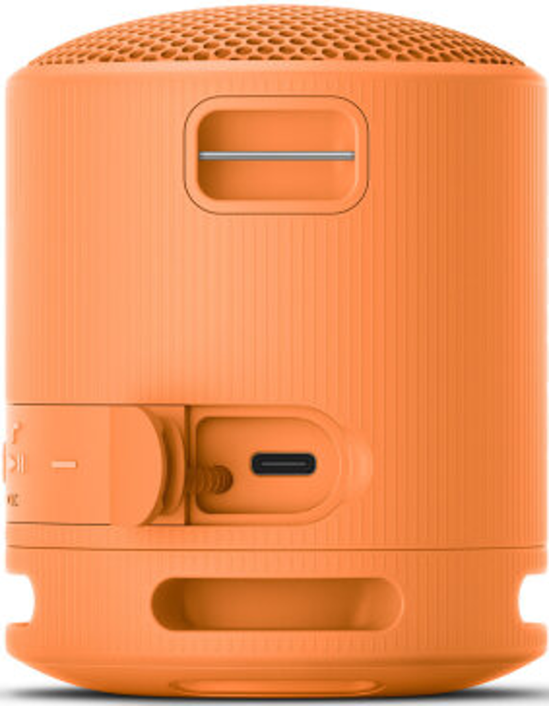 Haut-parleur orange avec commandes latérales et un port USB-C.