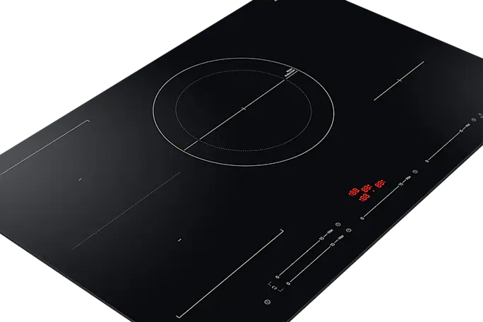 A black induction cooktop with a digital display, showing the temperature.