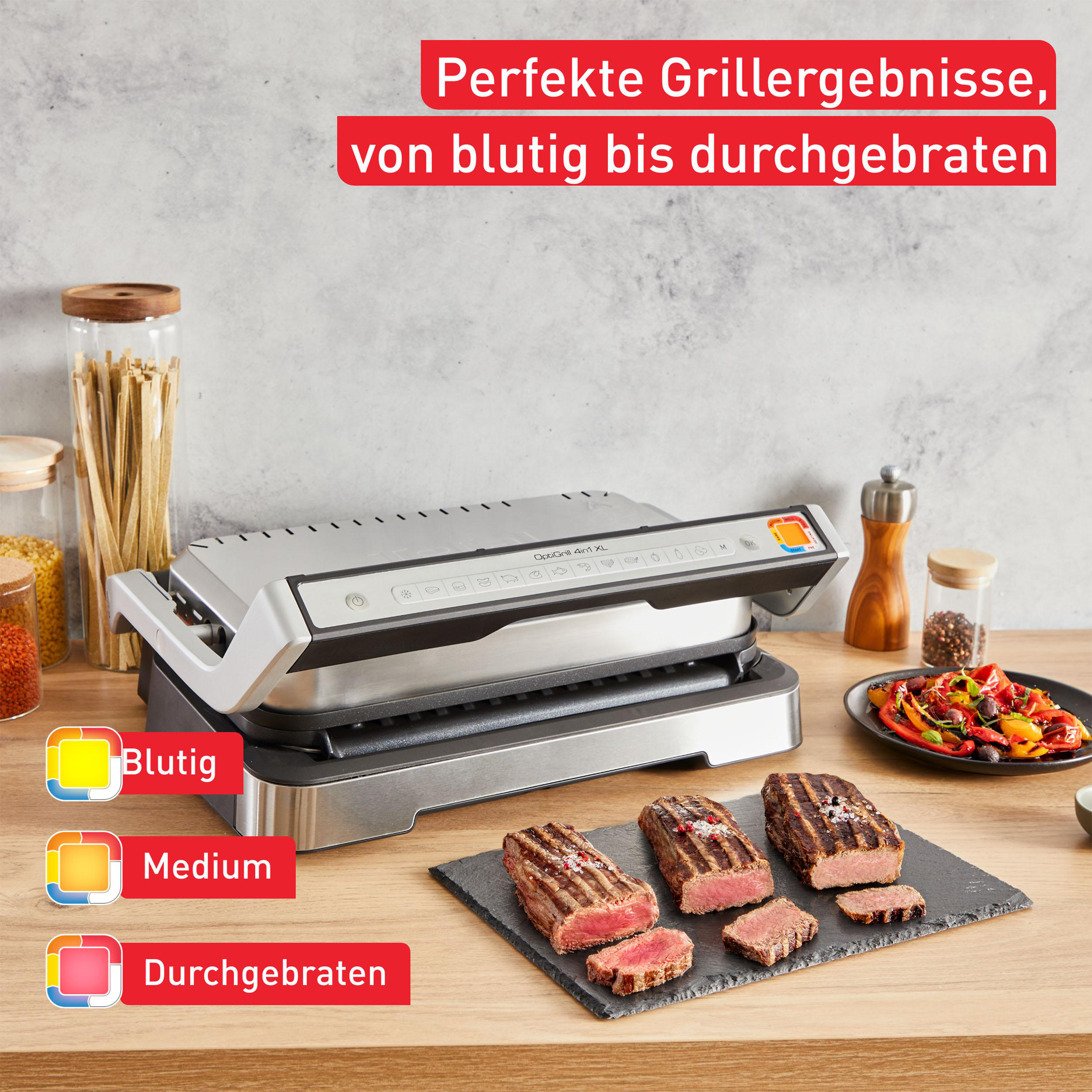 Grill mit gebratenen Steaks, die Garstufen zeigen: blutig, medium und durchgebraten.