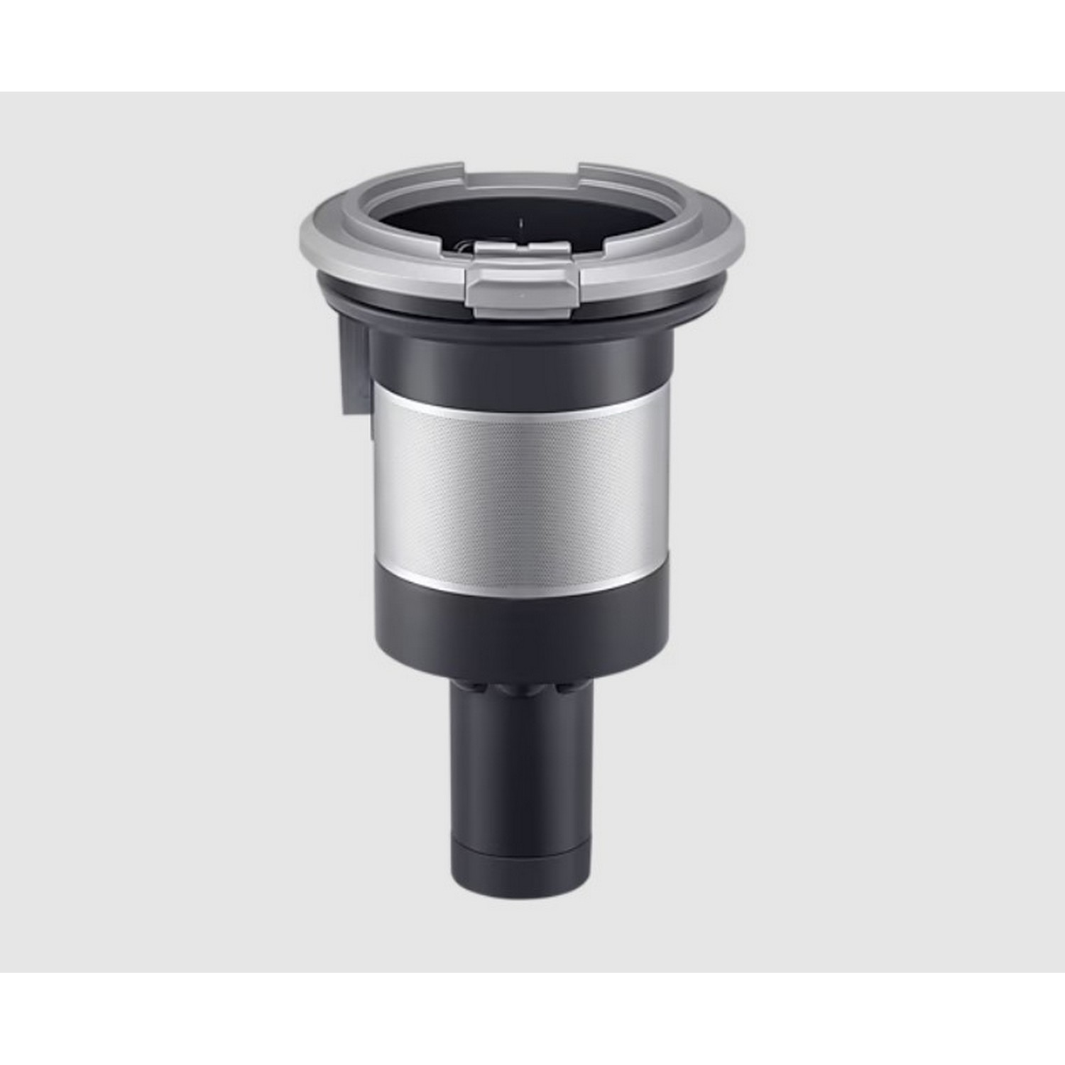 An appliance component, a cylindrical silver speaker unit with a black base and top, against a light background.
