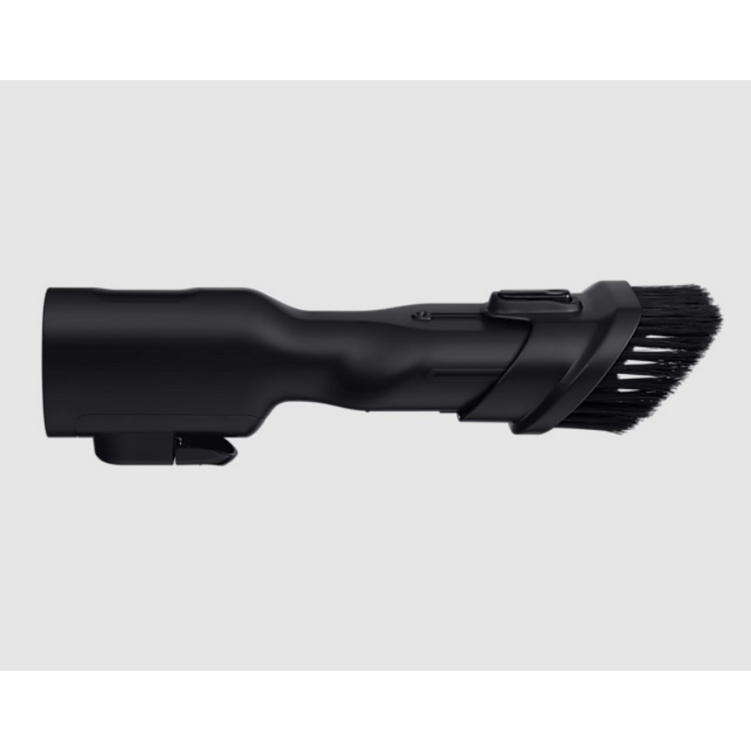 Black vacuum cleaner brush attachment. Angled brush head with bristles, and a connecting piece.