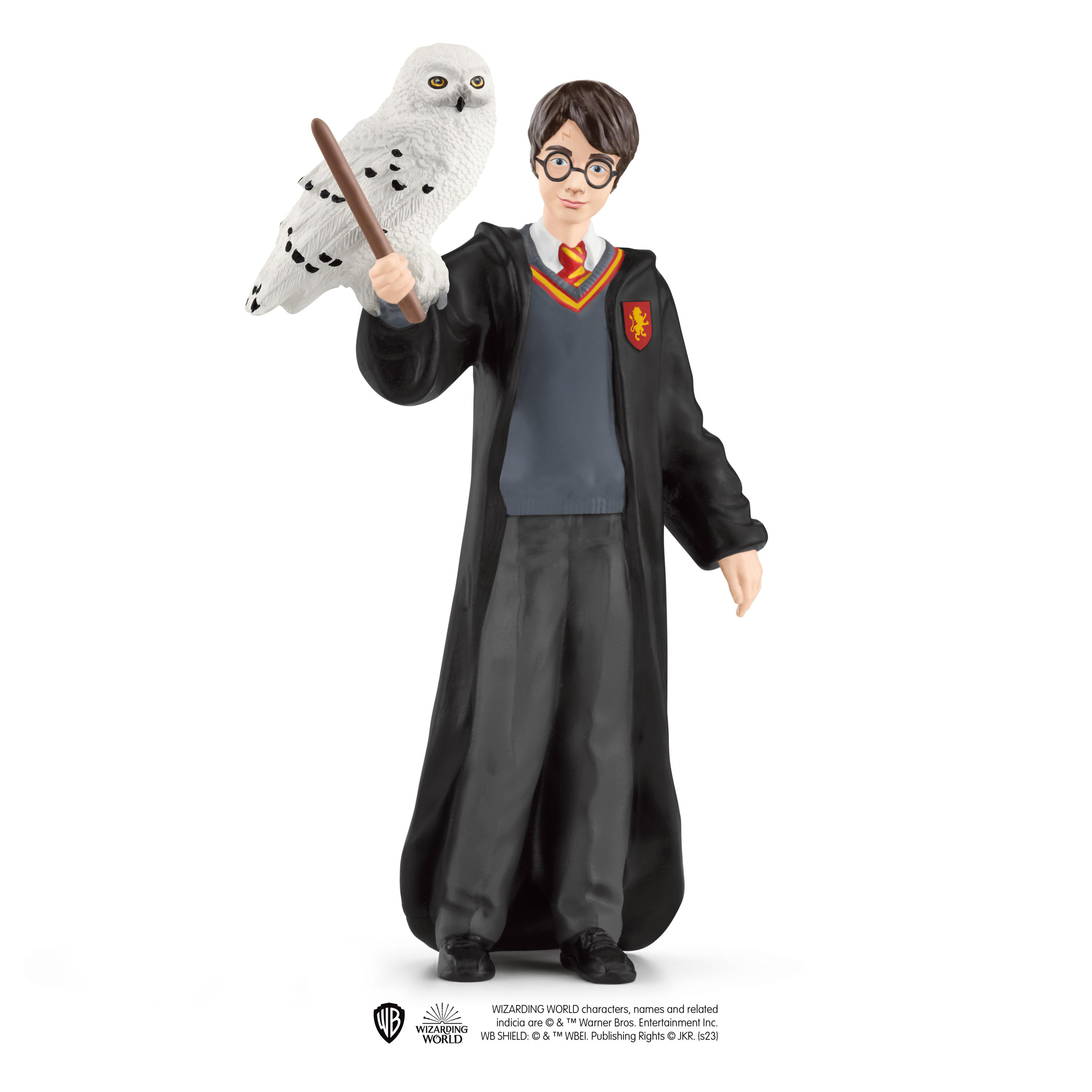 Harry Potter Figur, die einen Zauberstab und eine Eule hält. Er trägt eine Brille und einen Gryffindor-Umhang.
