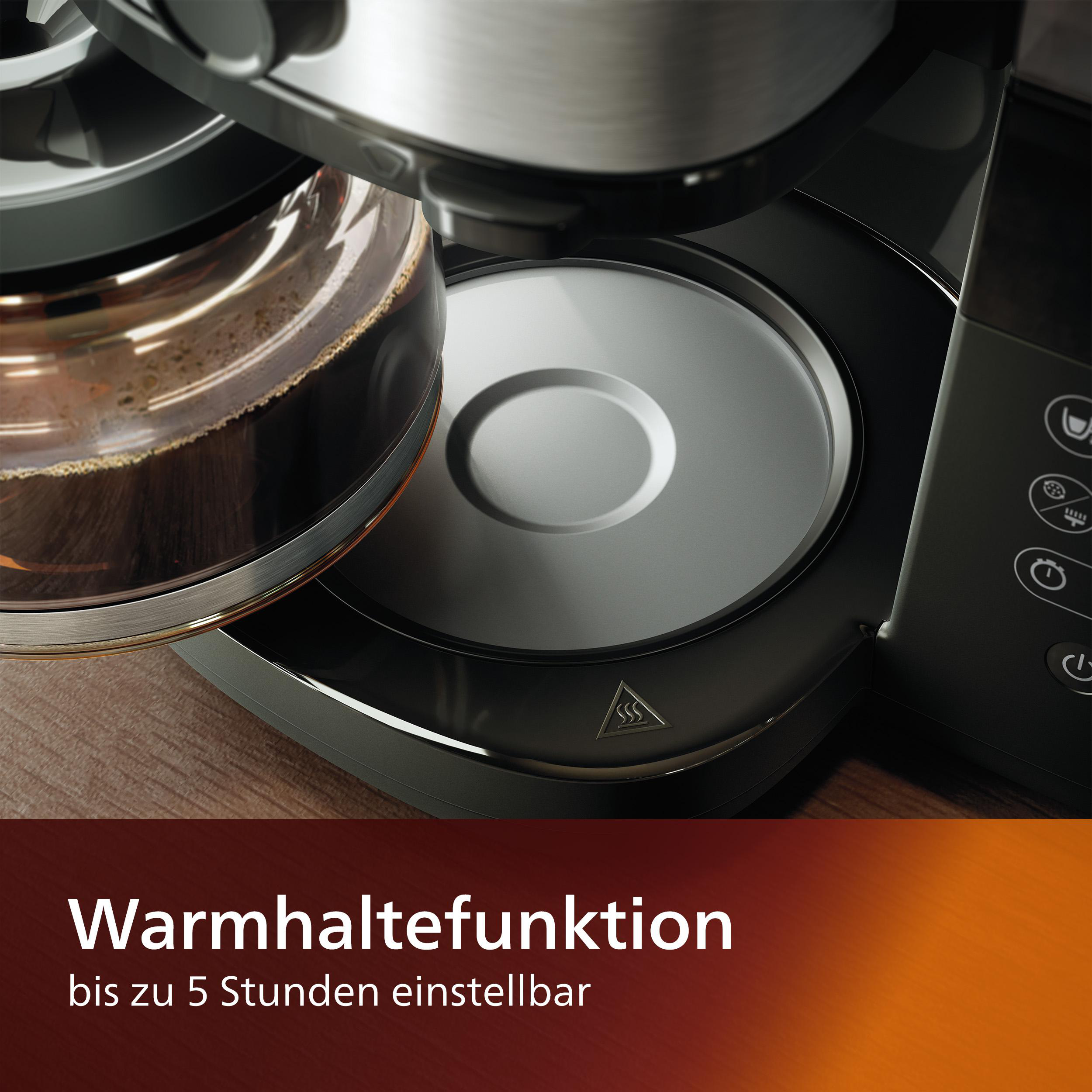 Nahaufnahme einer Kaffeemaschine mit Text über das Warmhalten von Kaffee.