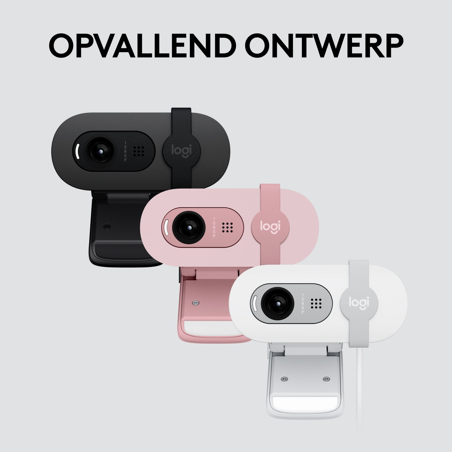 Three webcams in a row, black, pink, and white. The text 'OPVALLEND ONTWERP' is above the webcams.