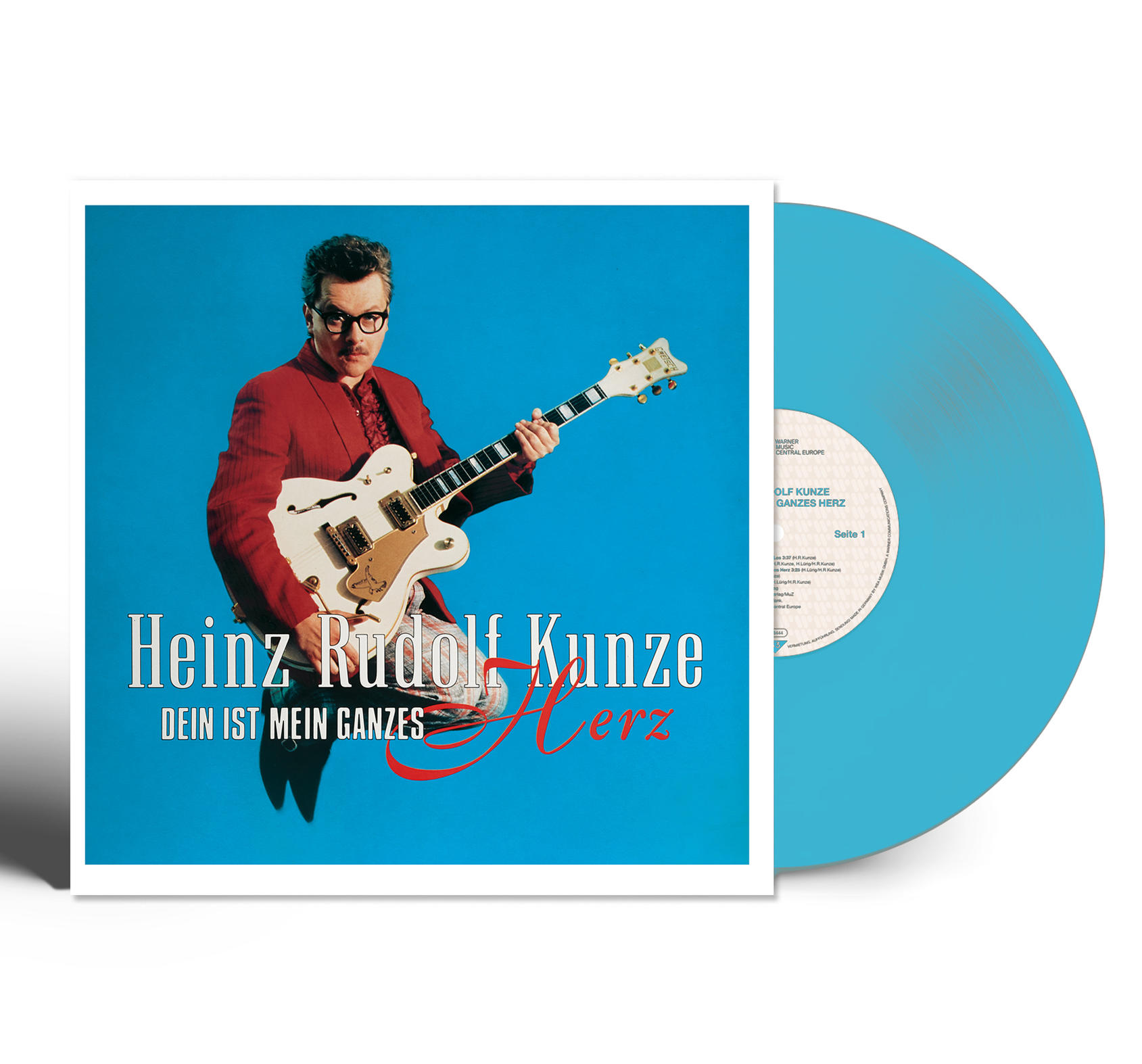 Albumcover mit Mann, der weiße Gitarre spielt, blaue Vinyl-Schallplatte daneben.