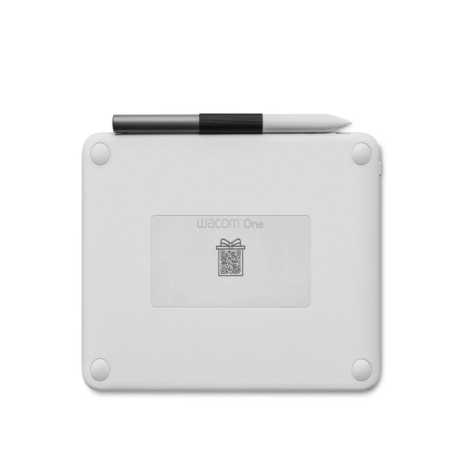 A white drawing tablet with a pen on top.