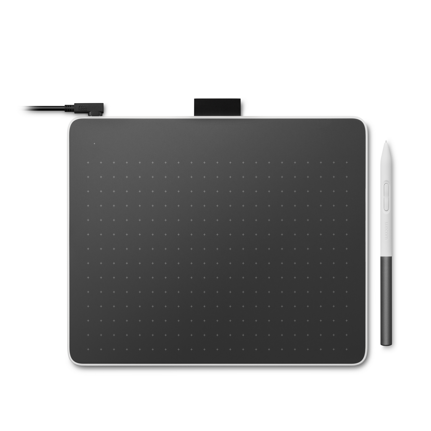A black drawing tablet with a connected cable and a white stylus is on a white surface.