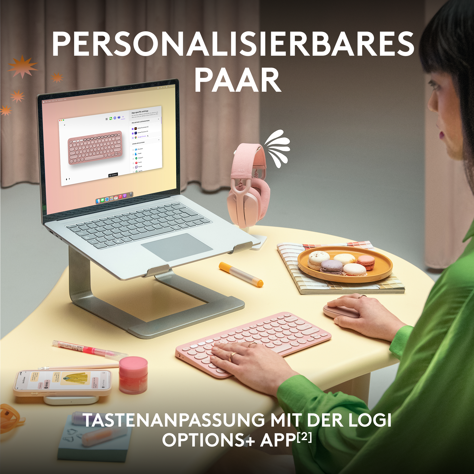 Ein Laptop mit Tastatur, Kopfhörern, Telefon, Maus und Zubehör auf gelber Oberfläche.