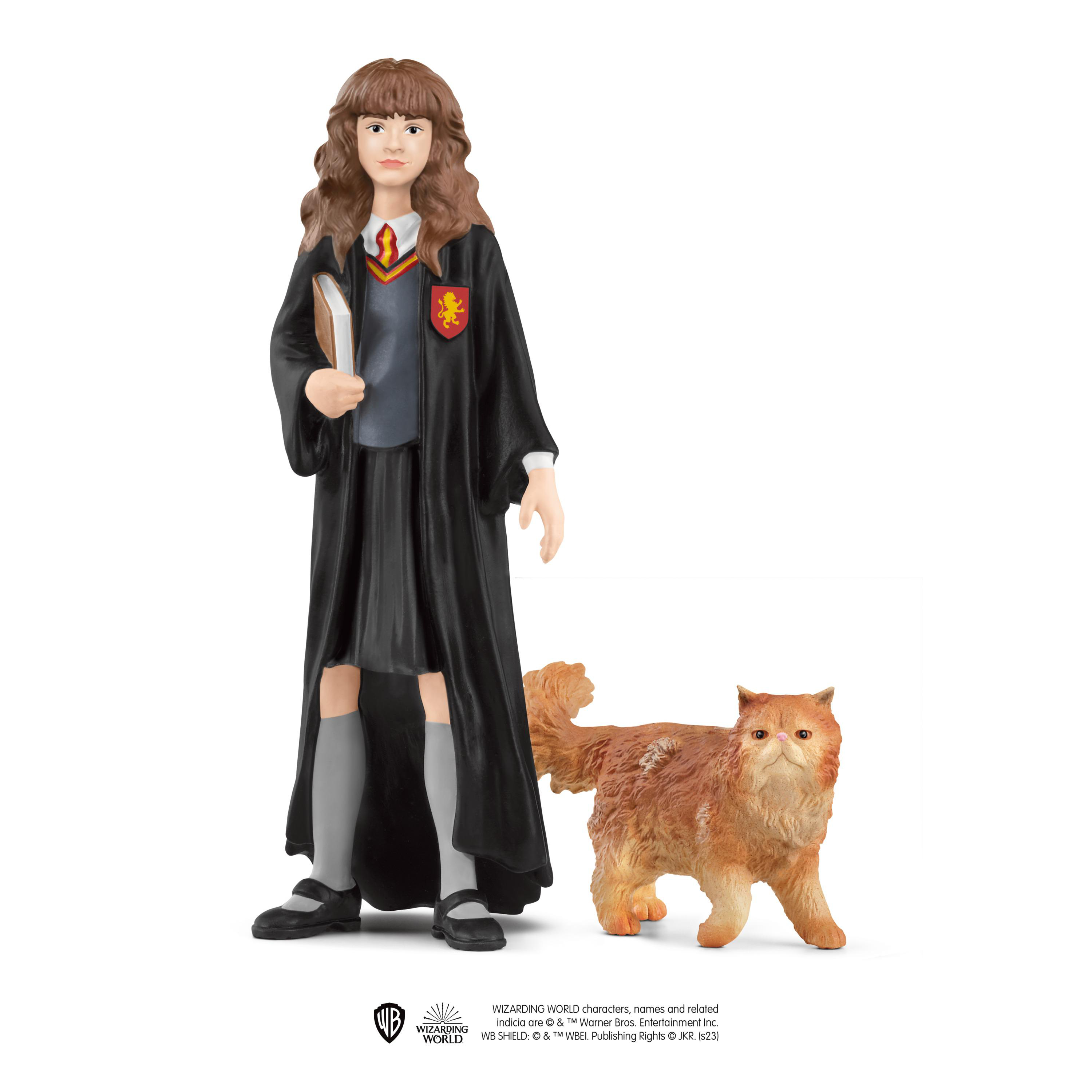 Hermine Granger Figur mit Buch und Katzenfigur aus Harry Potter.