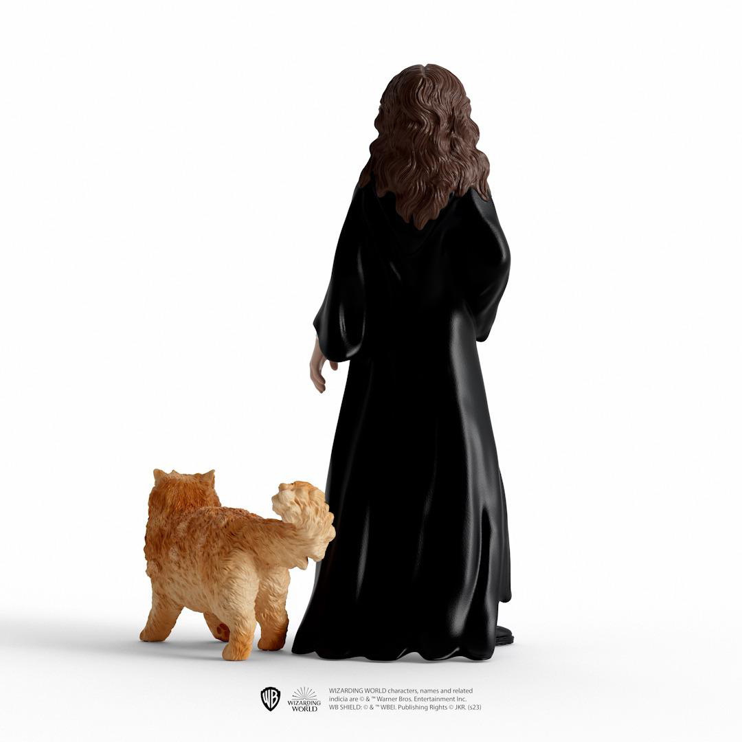 Figur im schwarzen Umhang und kleiner Hund auf weißem Hintergrund, von hinten.