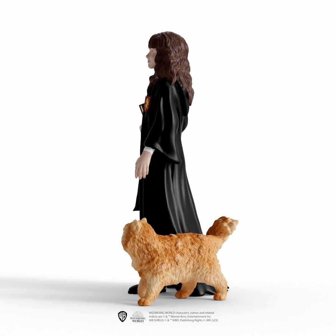 Figur einer Frau und einer Katze, Seitenansicht, weißer Hintergrund.