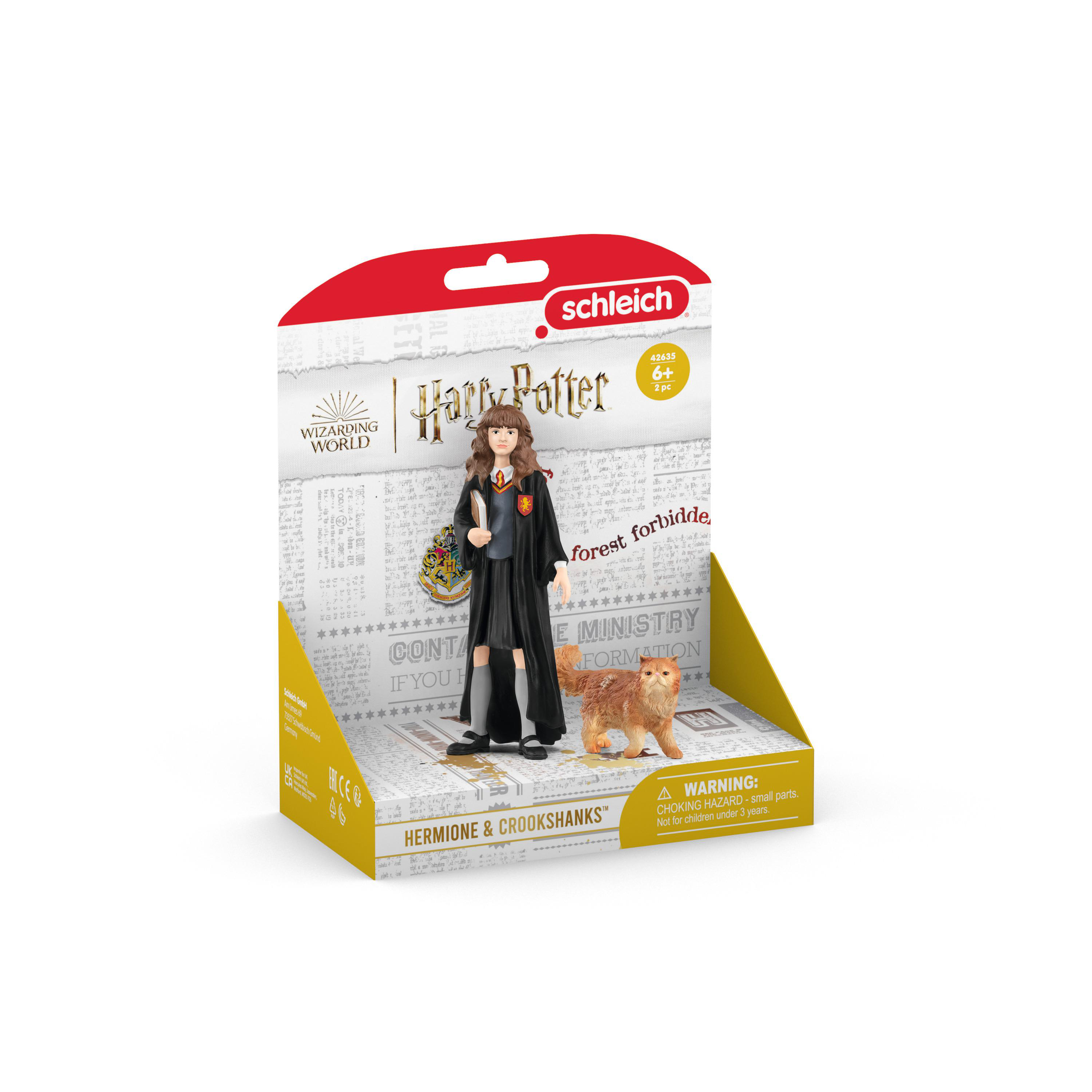 Eine Spielzeugkiste mit einer Harry-Potter-Figur von Hermine und Krummbein.