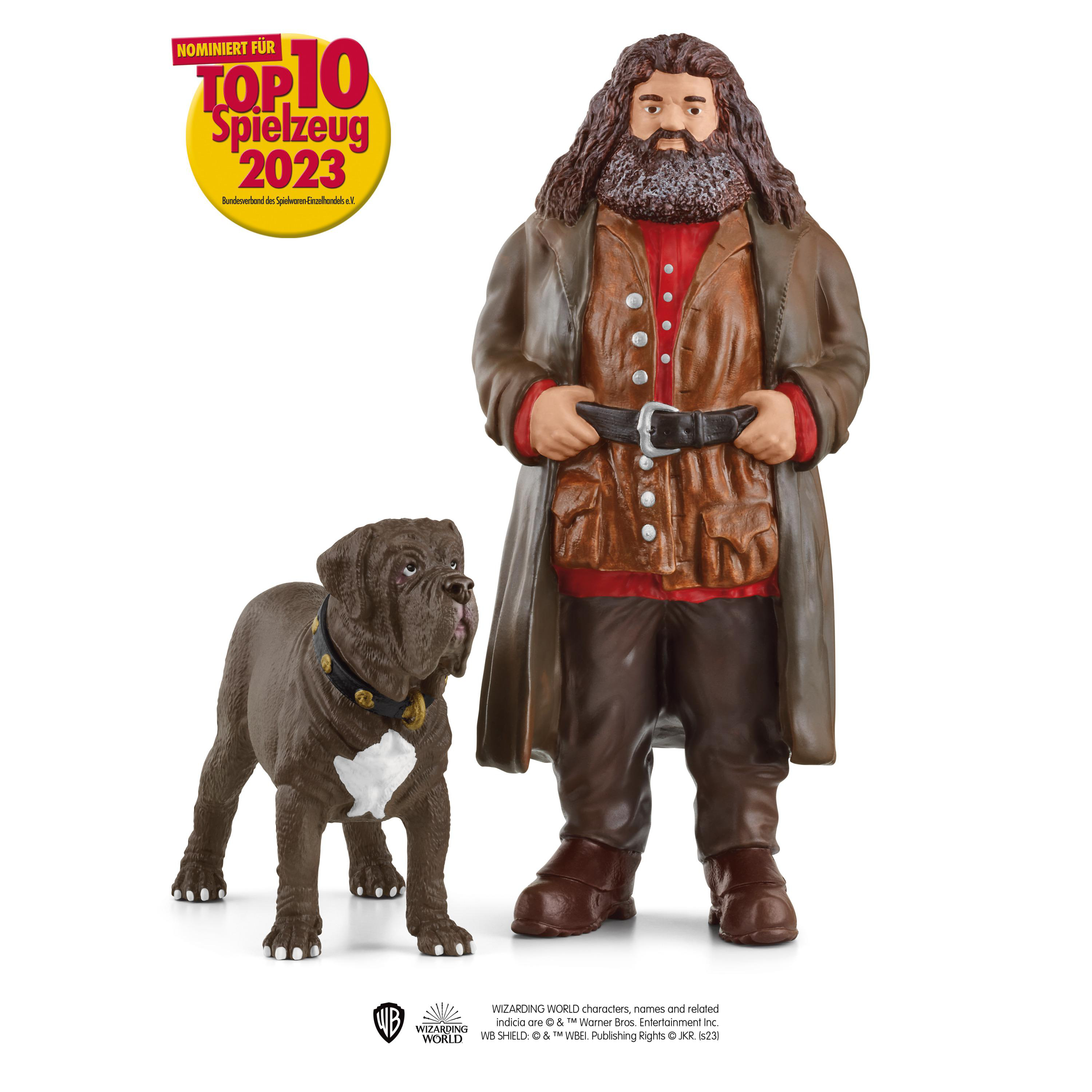 Hagrid-Figur mit Hund. Hagrid trägt einen braunen Mantel. Auszeichnung vorhanden.