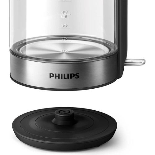 Beyaz bir yüzeyde şeffaf bir su ısıtıcısı ve kapak, siyah bir taban ve Philips logosu ile.