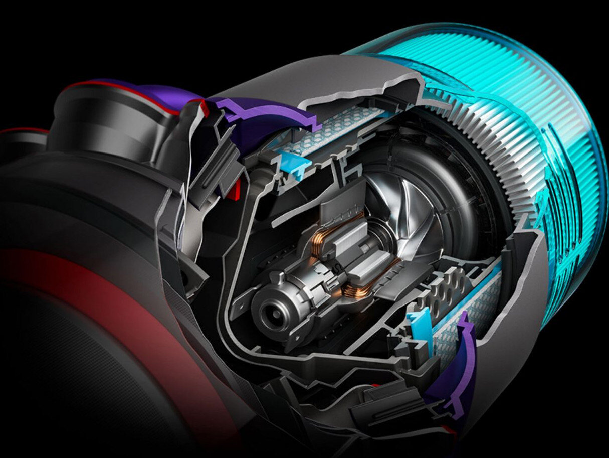 Widok przekrojowy silnika odkurzacza. Widoczne są elementy wewnętrzne.