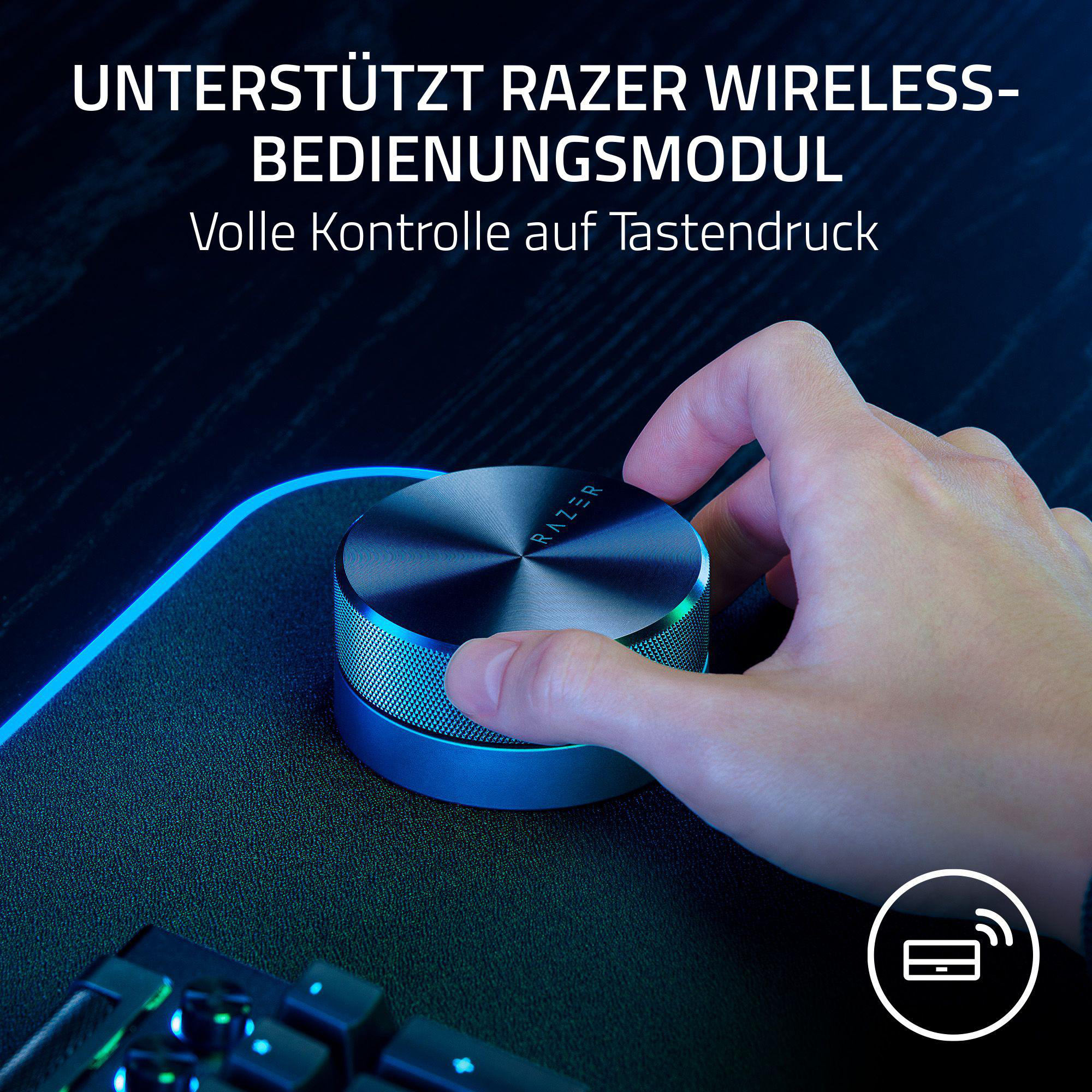 Die Hand einer Person benutzt ein Razer-Gerät. Der Text oben lautet: „Unterstützt das Razer Wireless-Steuermodul“.