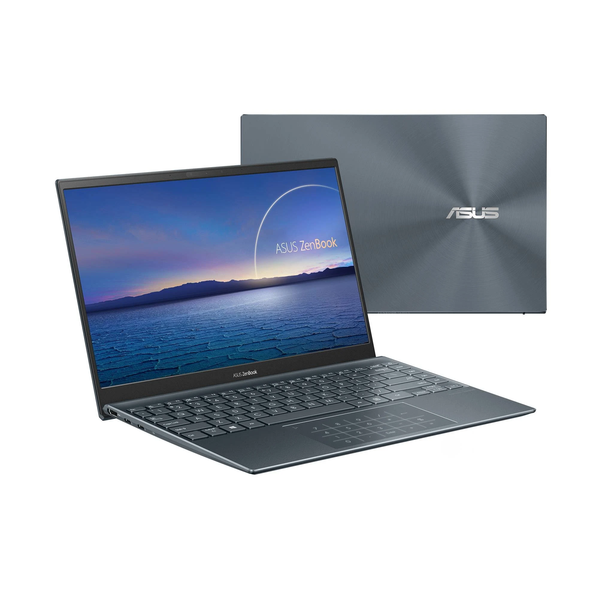 Portátil con pantalla azul mostrando un paisaje, y un portátil cerrado con el logo de ASUS.