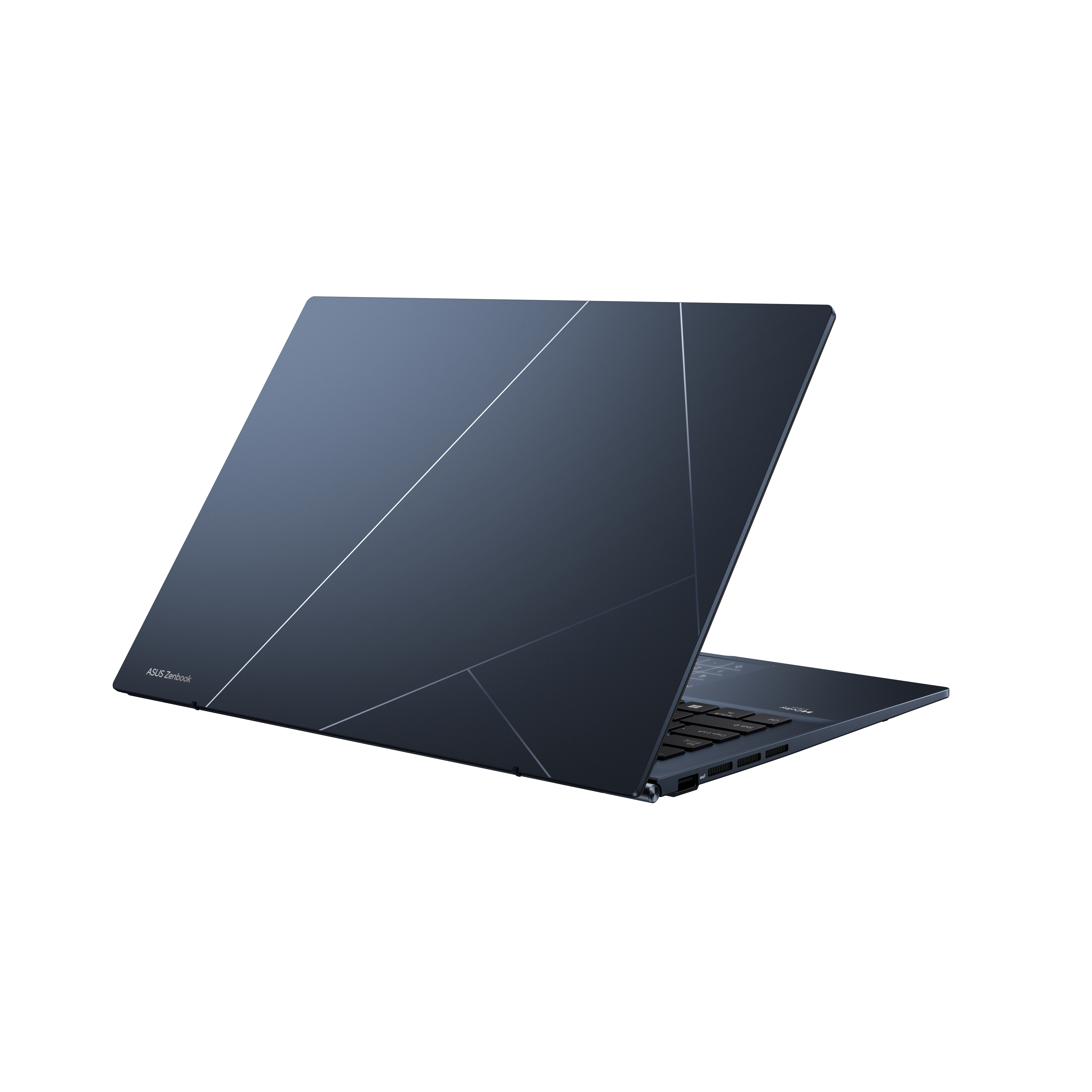 Portátil Asus Zenbook azul oscuro con diseño geométrico plateado en la parte trasera.