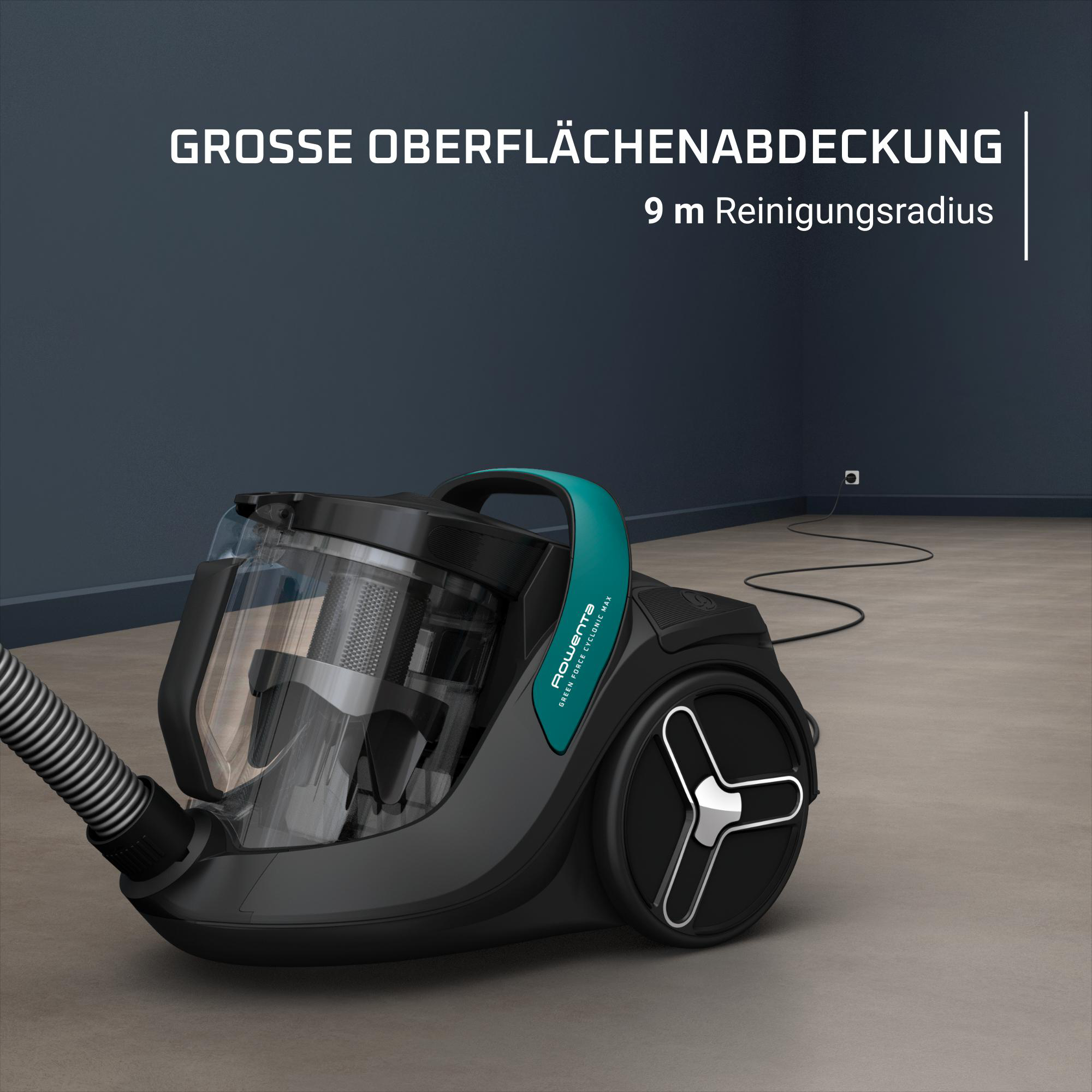 Schwarzer und türkisfarbener Staubsauger auf Holzboden. Text: Große Flächenabdeckung und 9 m Reinigungsradius.