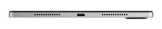 Widok z boku srebrnego tabletu z portem USB-C i otworami na głośniki.