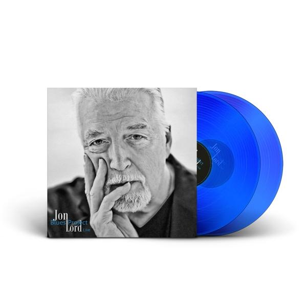 Album borító. Szakállas férfi, kezével az arcán. Kék bakelit lemezek.