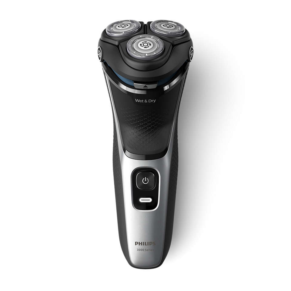 Schwarzer und silberner elektrischer Philips-Rasierer mit drei rotierenden Köpfen, Wet & Dry-Etikett und Ein-/Aus-Taste.