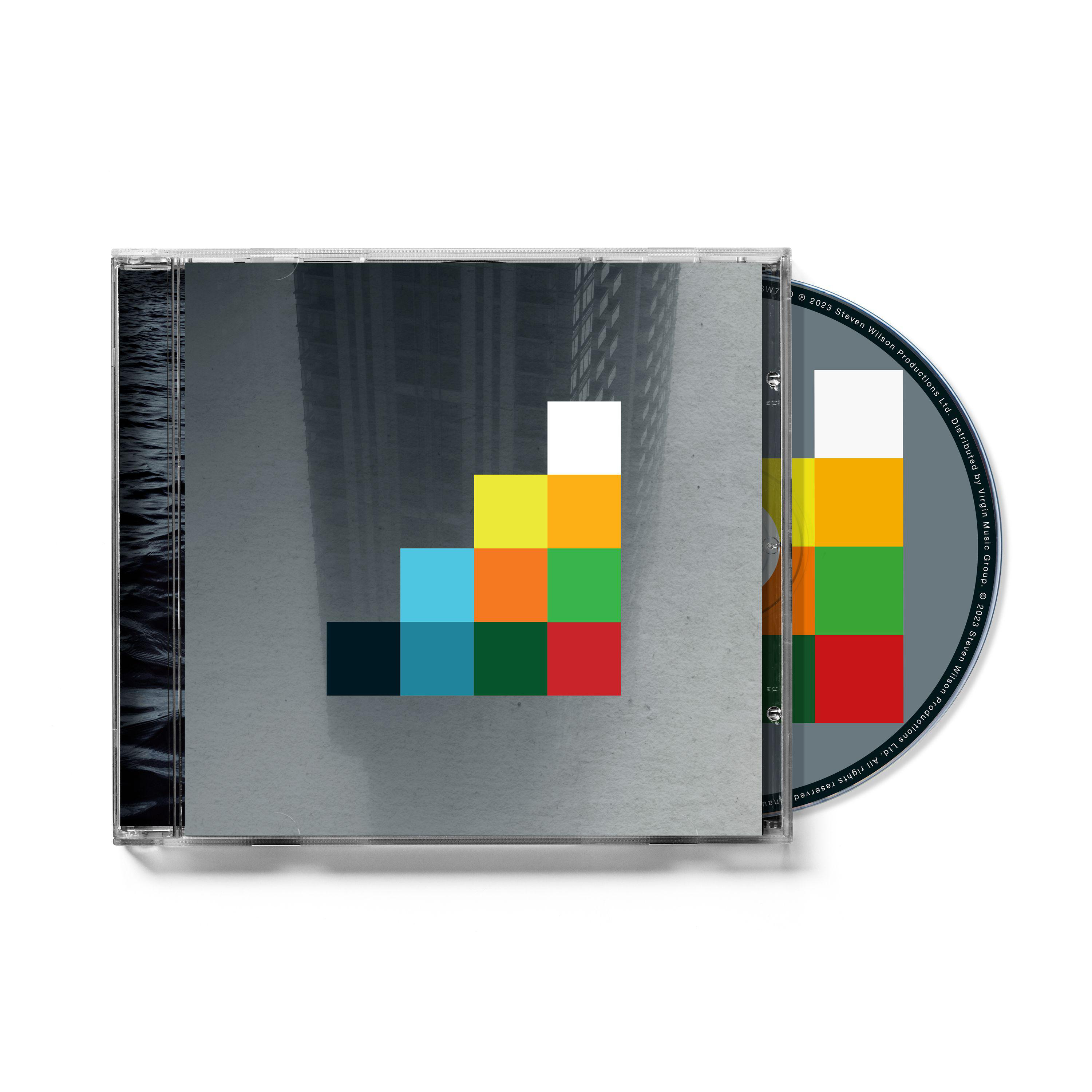 Das CD-Cover ist grau mit einem farbenfrohen Design. Die CD ist teilweise aus der Hülle entnommen.