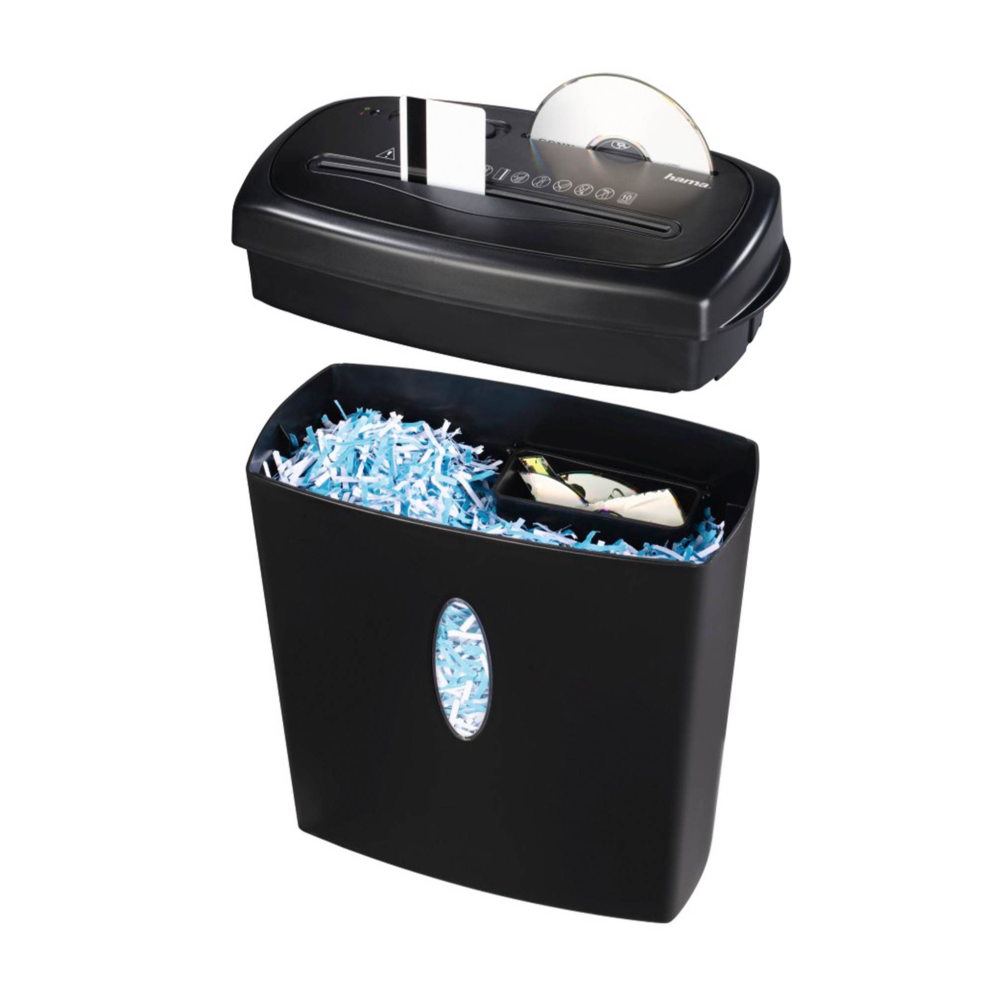 Una destructora de papel negra con un cubo debajo, papel triturado, CD y tarjeta de crédito.