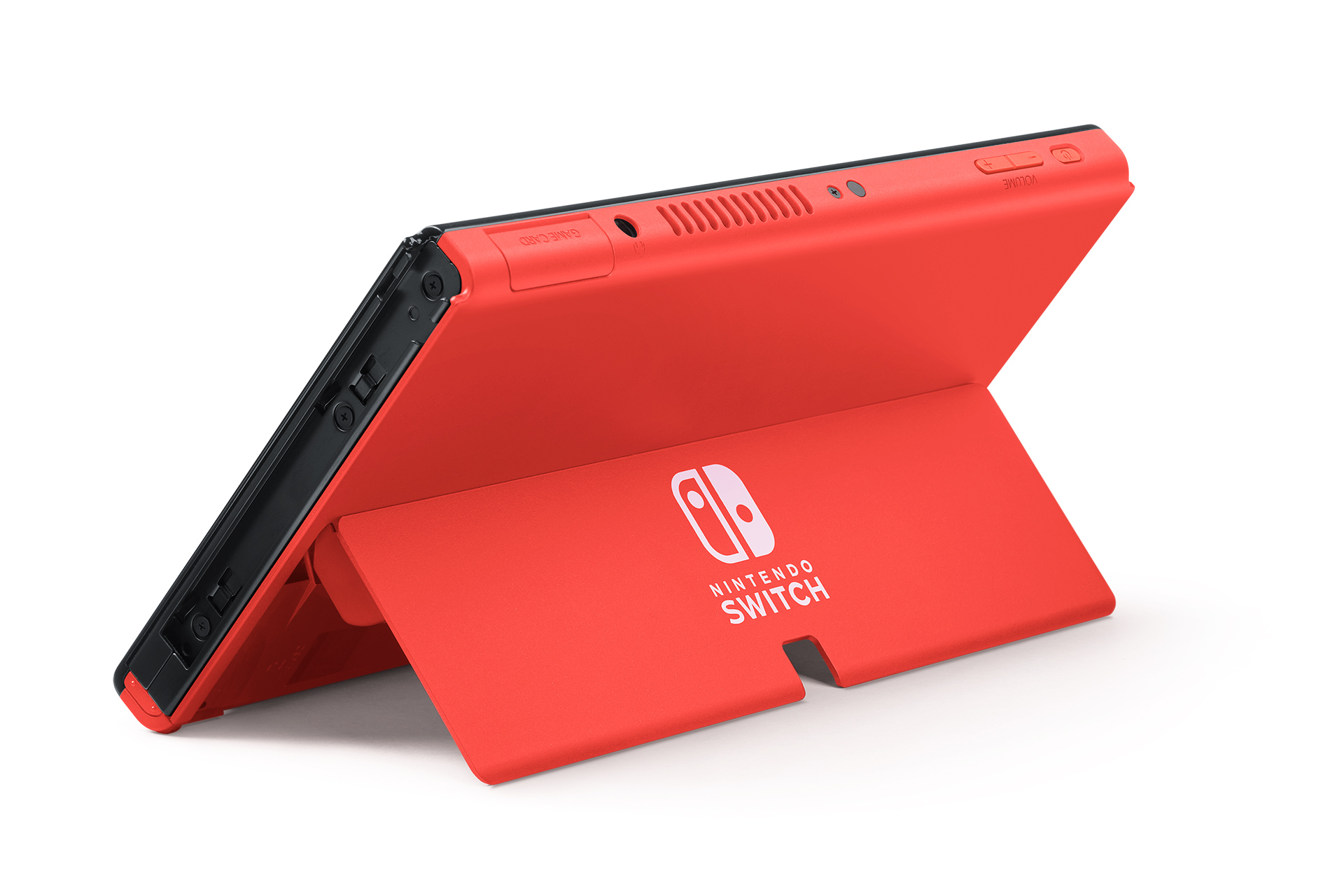 Una consola Nintendo Switch roja en un soporte. La pantalla está mirando hacia otro lado.