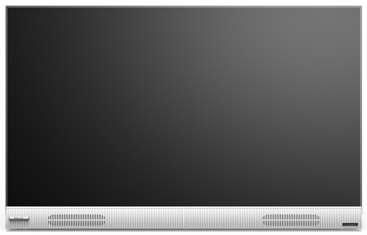 Telewizor z płaskim ekranem pokazujący jednolity czarny ekran, ze srebrną podstawą i głośnikiem.