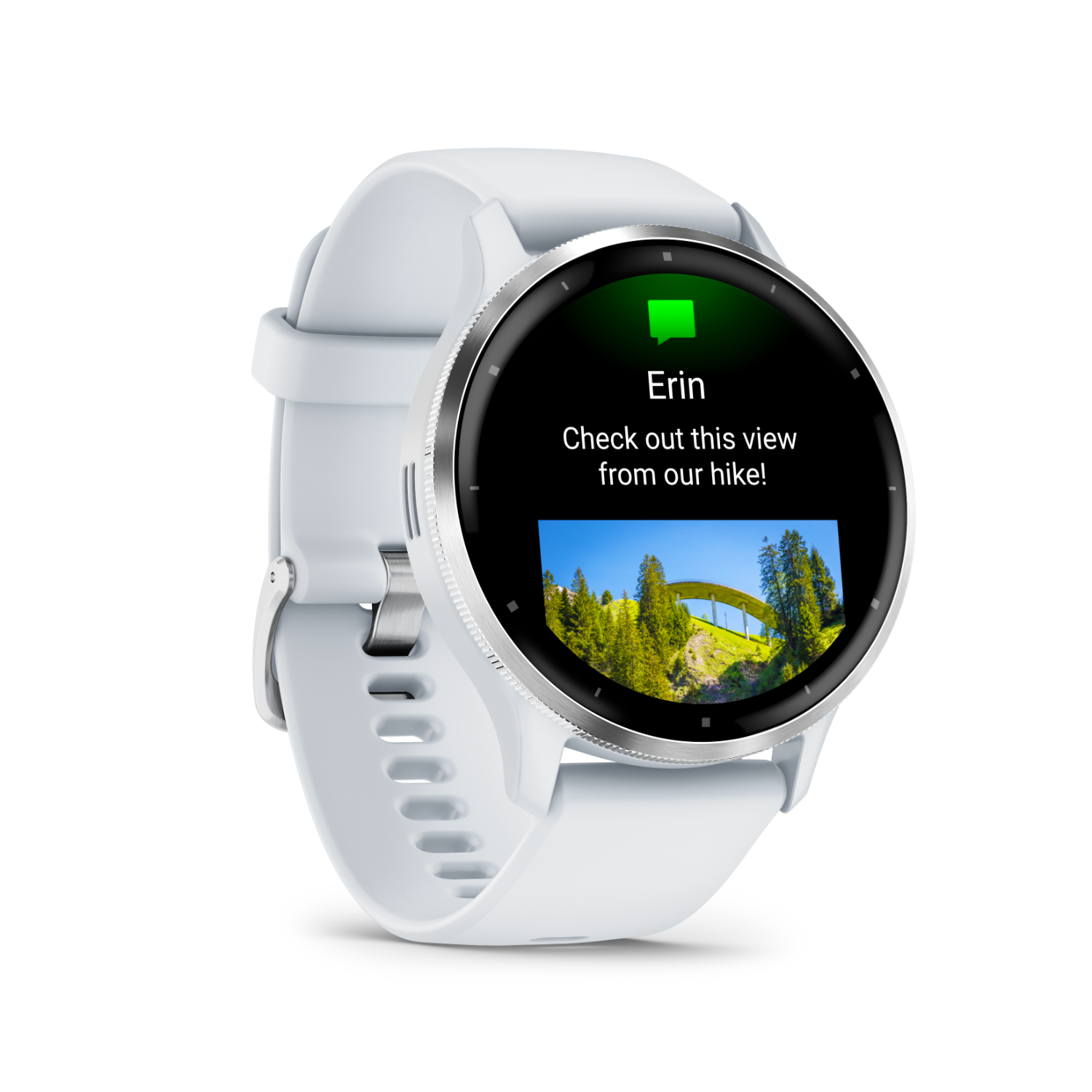 A white smartwatch displays a message from "Erin" about a hike view, with a picture of a bridge.