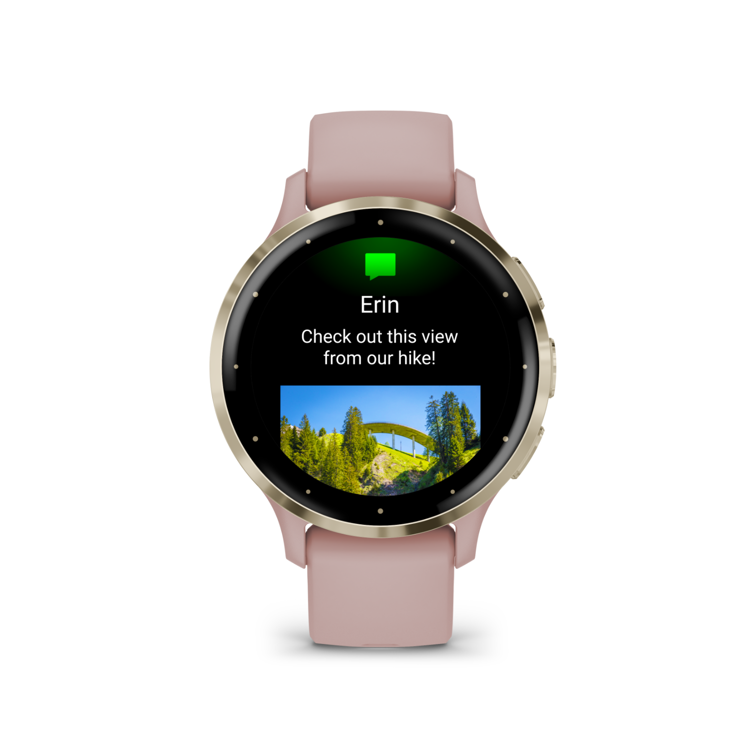 A smart watch with a pink strap displays a message, "Check out this view from our hike!" with a photo.