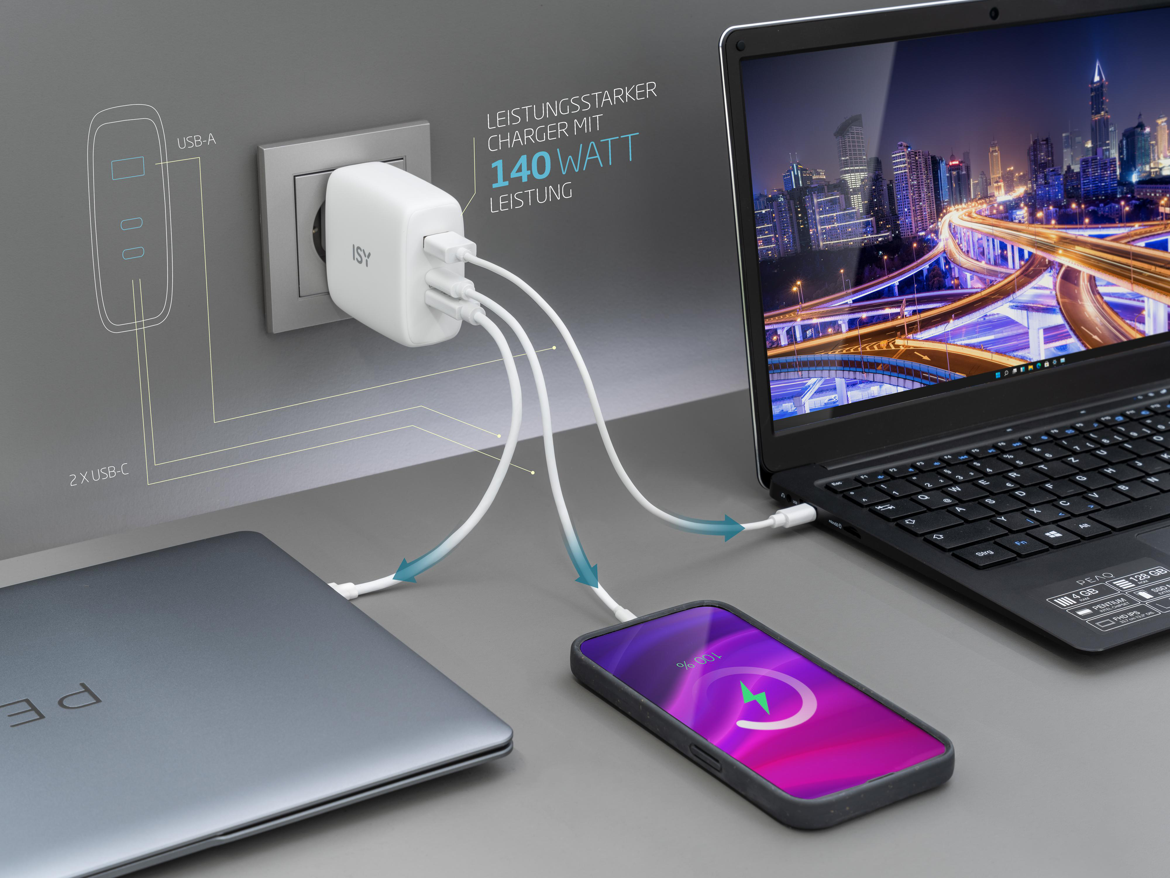 Ein Laptop, Smartphone und Ladegerät-Setup. Das Ladegerät hat mehrere USB-Anschlüsse.