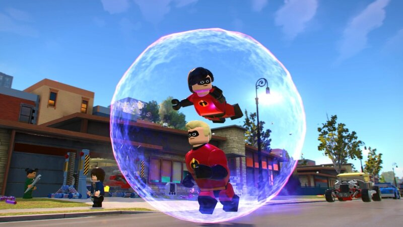 Scena z Lego Iniemamocni. Pan Iniemamocny i Violetta w bańce, inne figurki Lego w tle.