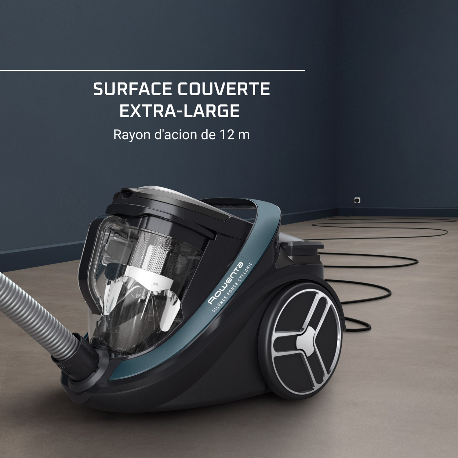 Aspirateur noir avec un tuyau et un accent bleu.