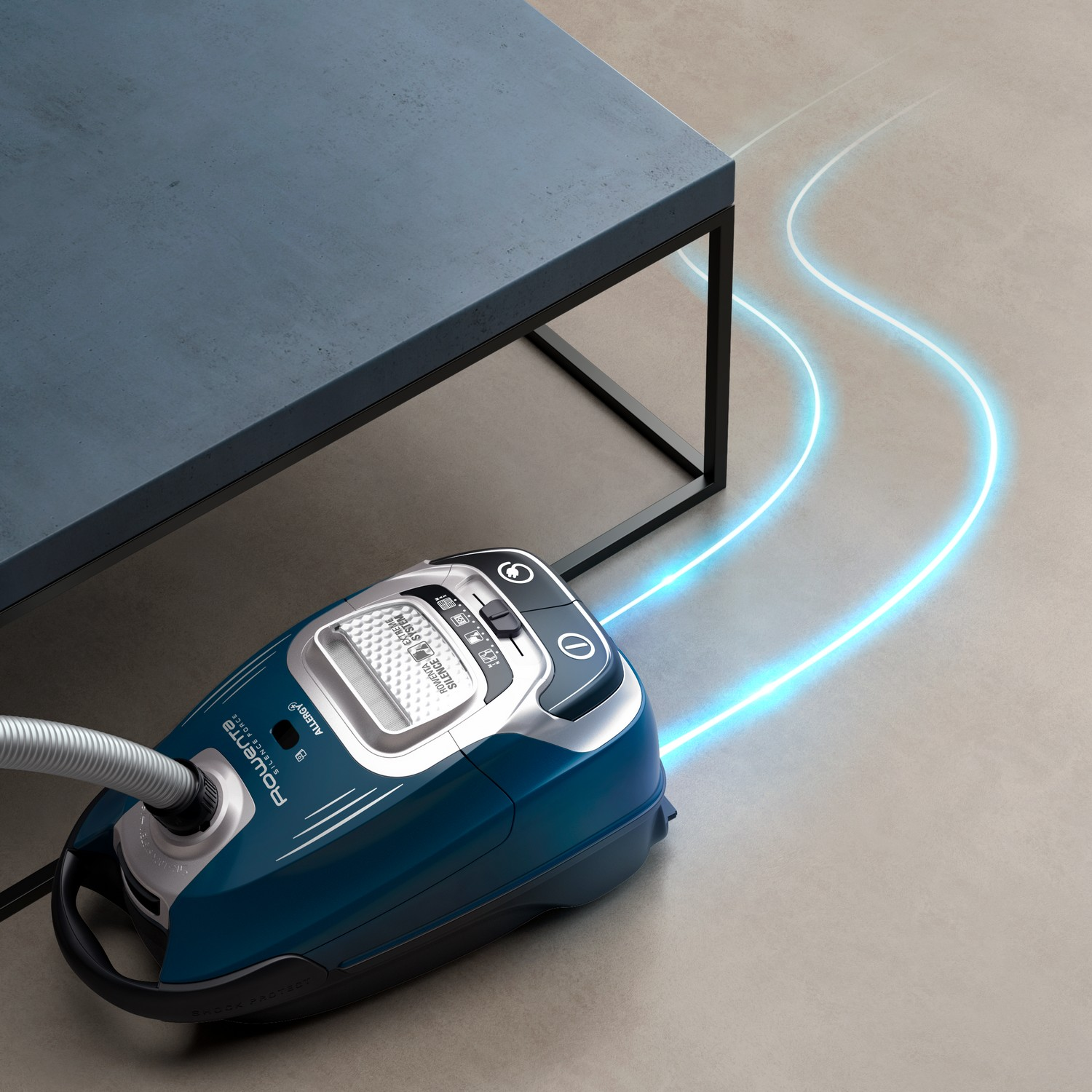 Een blauwe stofzuiger op een vloer met gestileerde lichtsporen en een tafel.