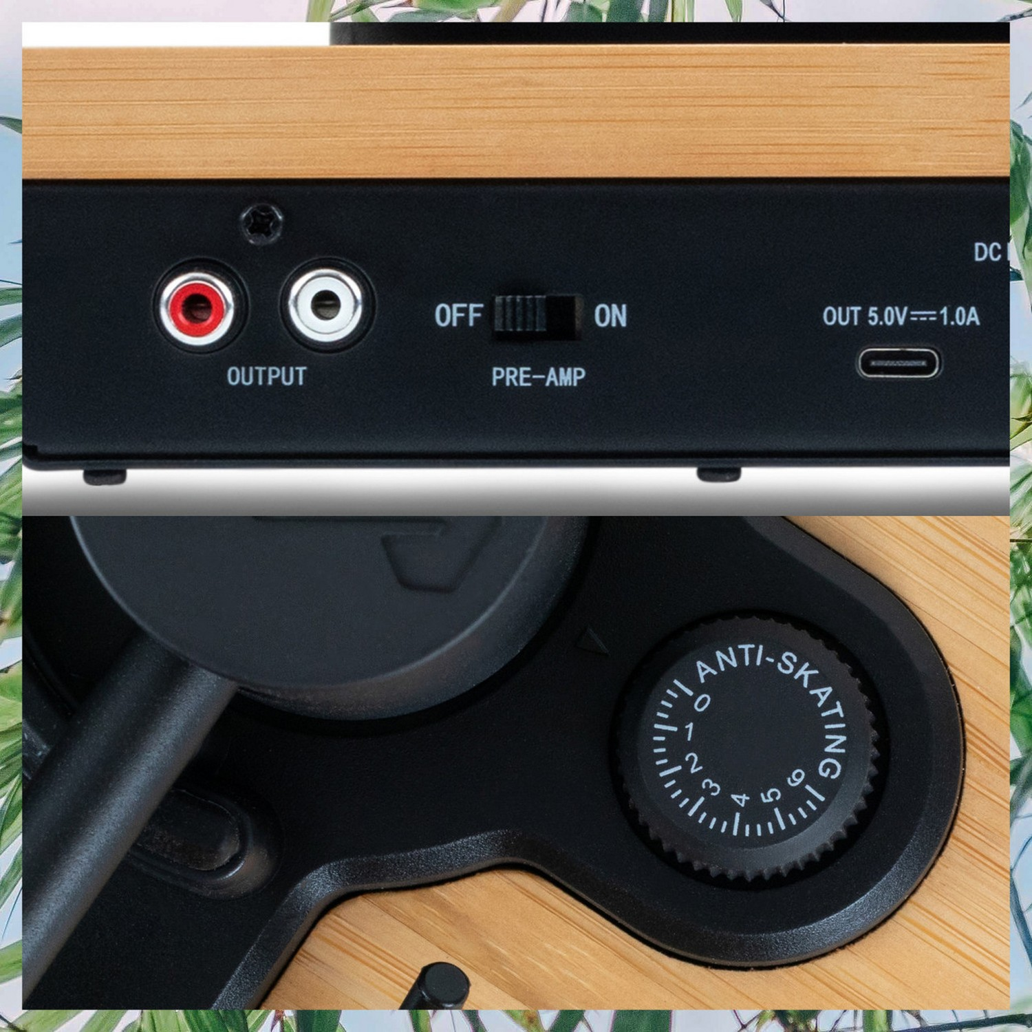 Close-up van het achterpaneel van een platenspeler met audio-uitgangen en anti-skating draaiknop.