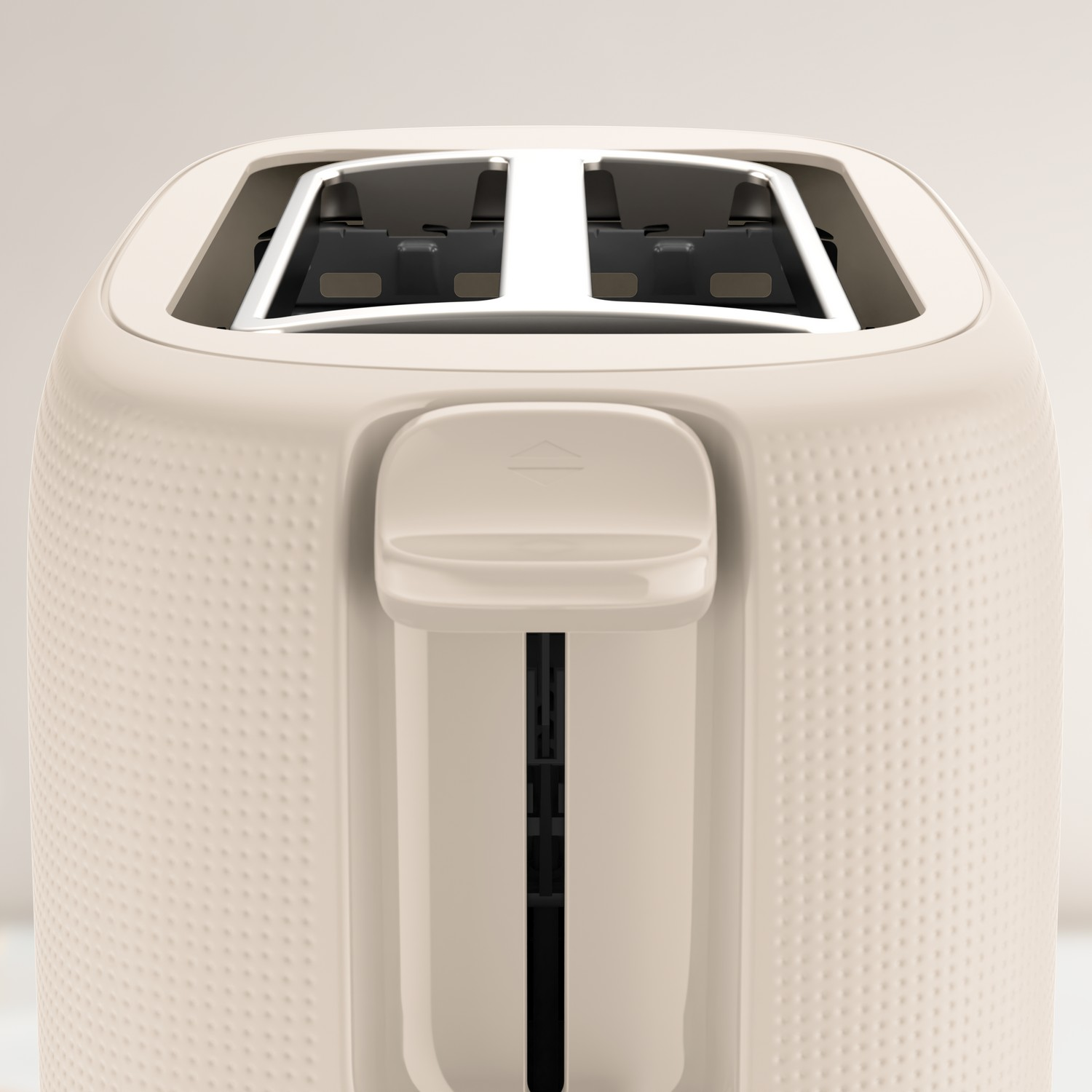Cream-colored toaster, front view, slots, button. Textured surface.