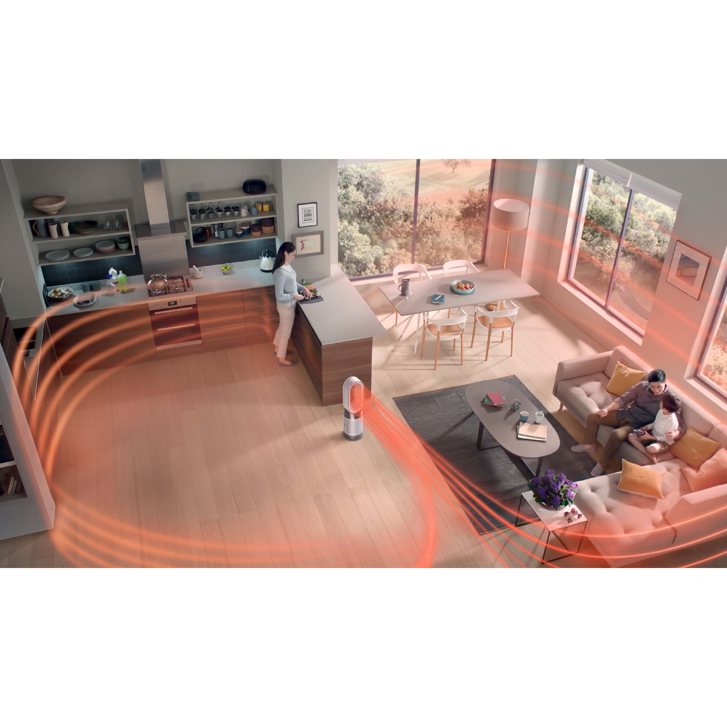 Moderne keuken en woonkamer. Een vrouw staat in de keuken. Een gezin zit op de bank.