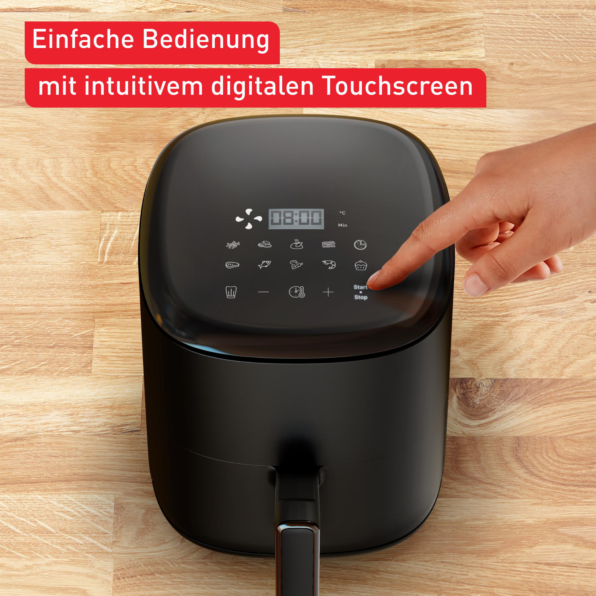 Schwarze Heißluftfritteuse, eine Hand berührt die Start/Stopp-Taste auf dem Bildschirm.