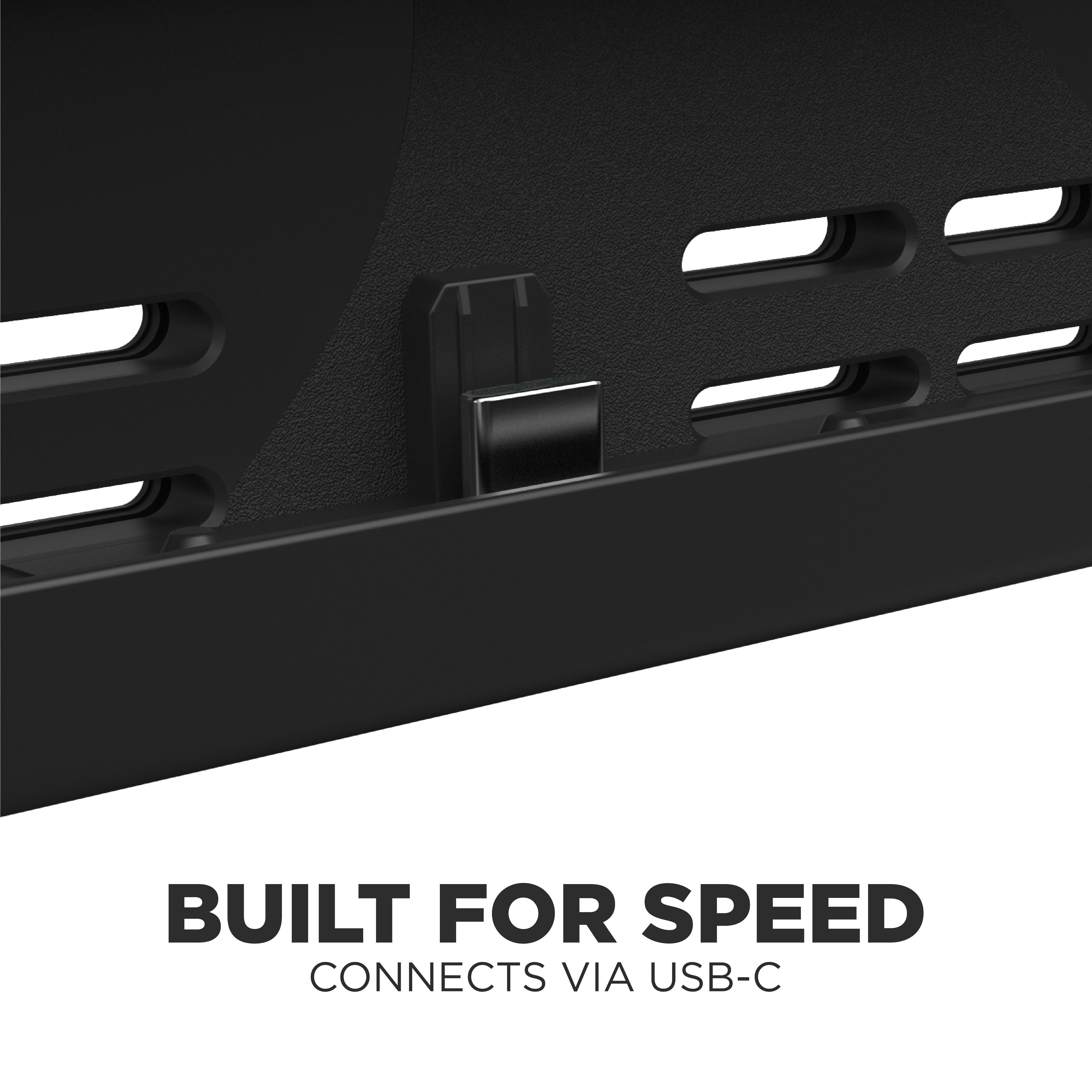 Nahaufnahme eines schwarzen Geräts mit Lüftungsschlitzen. Text: BUILT FOR SPEED, CONNECTS VIA USB-C.