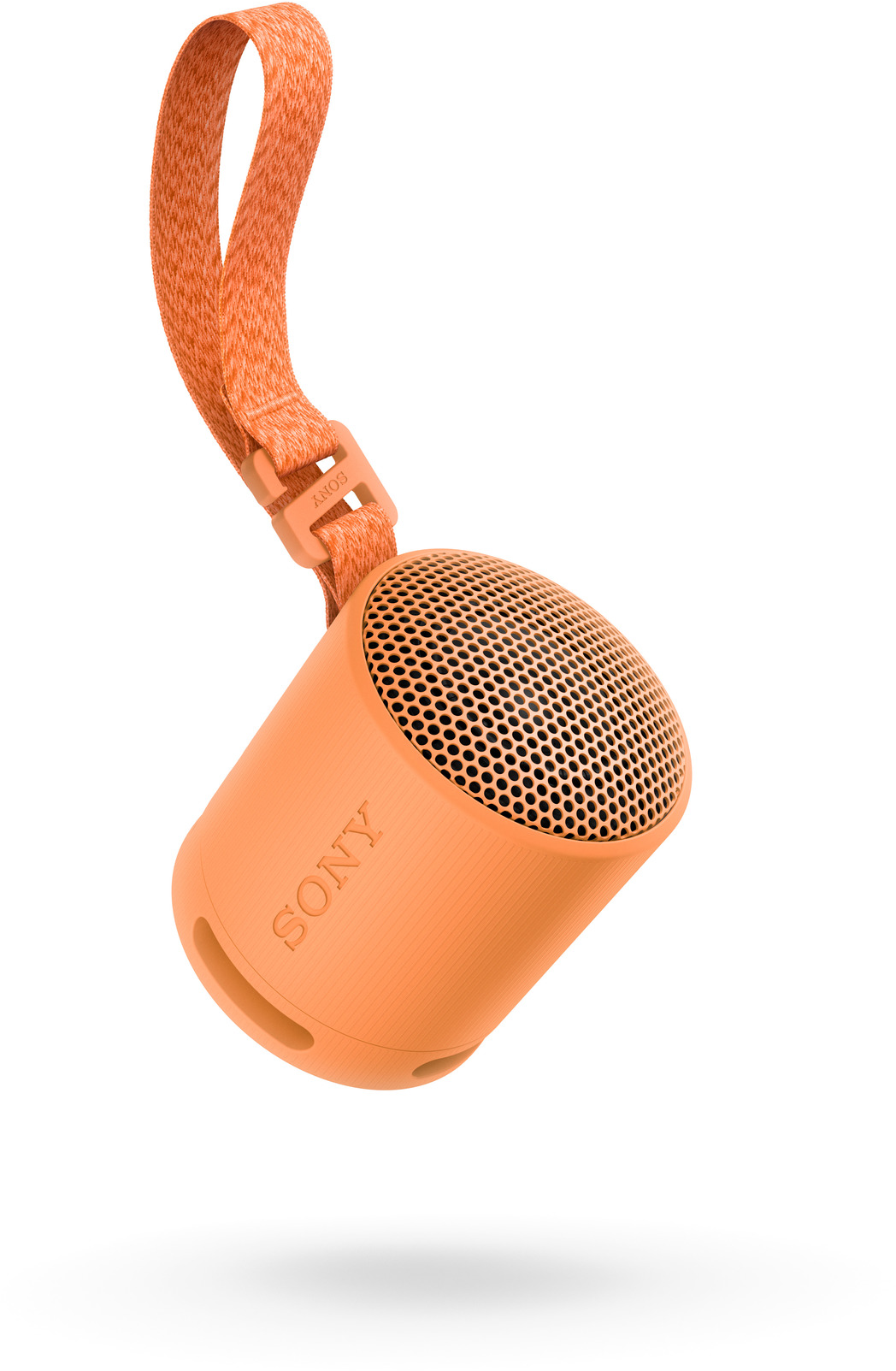 Narancssárga, hengeres Sony hangszóró hordozó pánttal. A levegőben függ.
