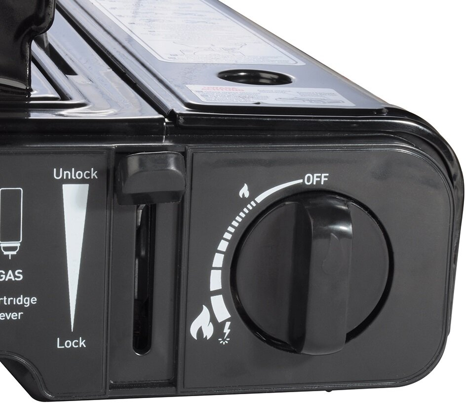 Czarny przenośny panel sterowania kuchenką gazową z pokrętłem "OFF" i suwakiem "Unlock".