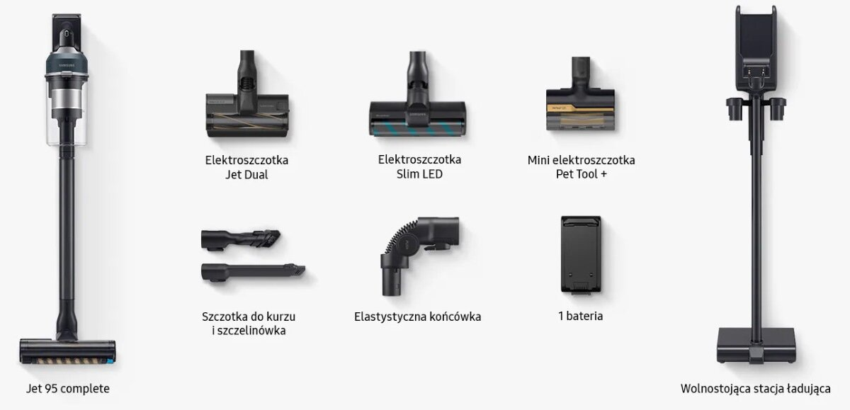 Odkurzacz z kilkoma akcesoriami na białym tle.
