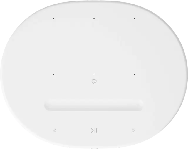 Haut-parleur blanc avec commandes supérieures : lecture, pause et volume.